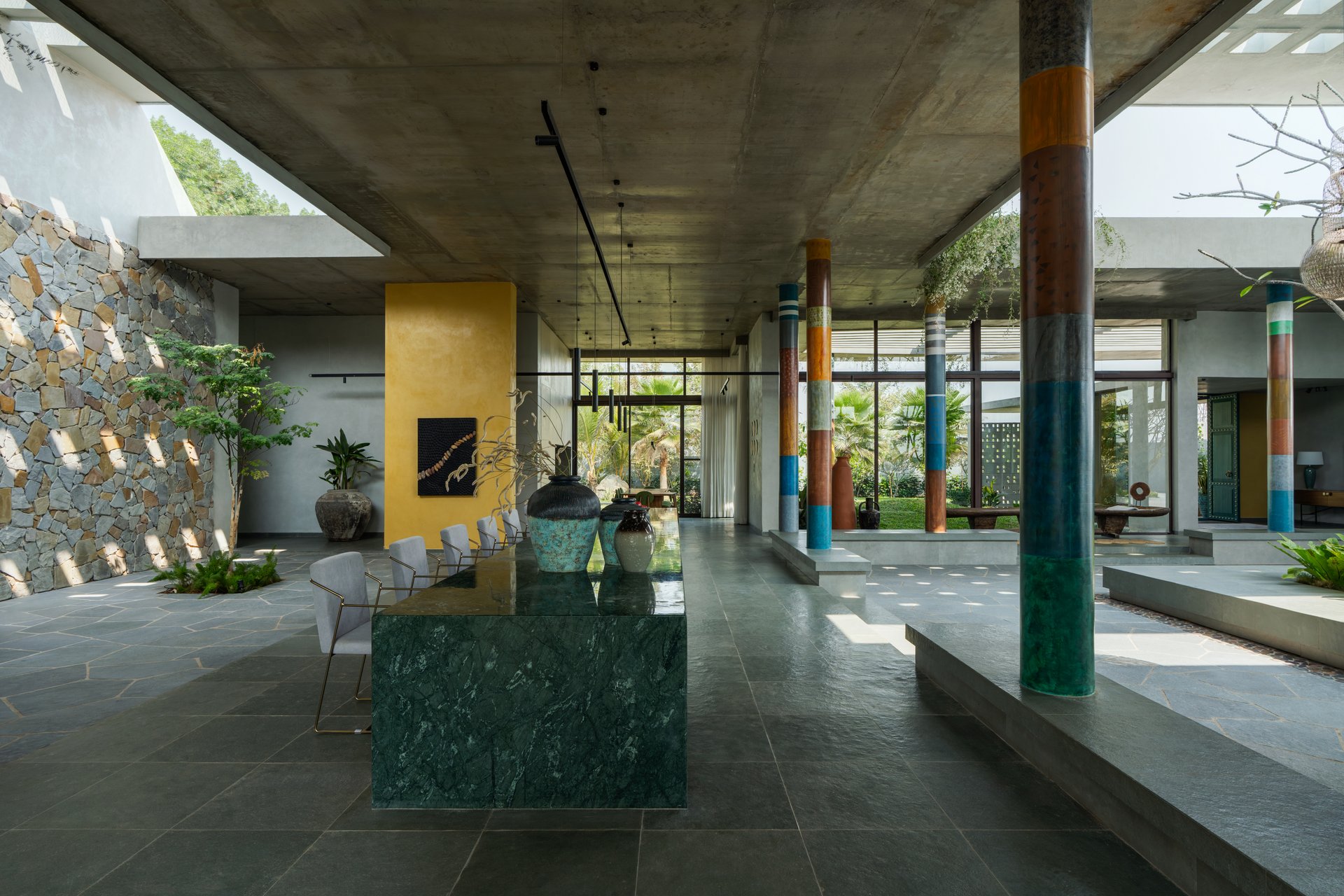 Dining and lounge area with colorful columns